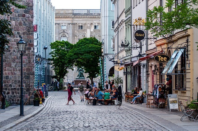 A cobblestone street cafe and restaurant in Berlin.