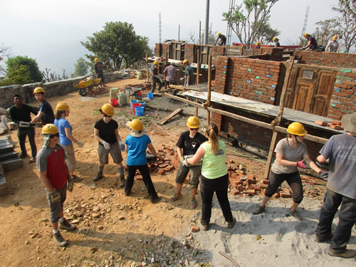 Teen service learning with a construction project abroad.