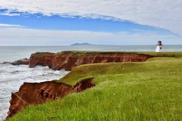 Cap Allright with one of the Islands' six working lighthouses in Canada