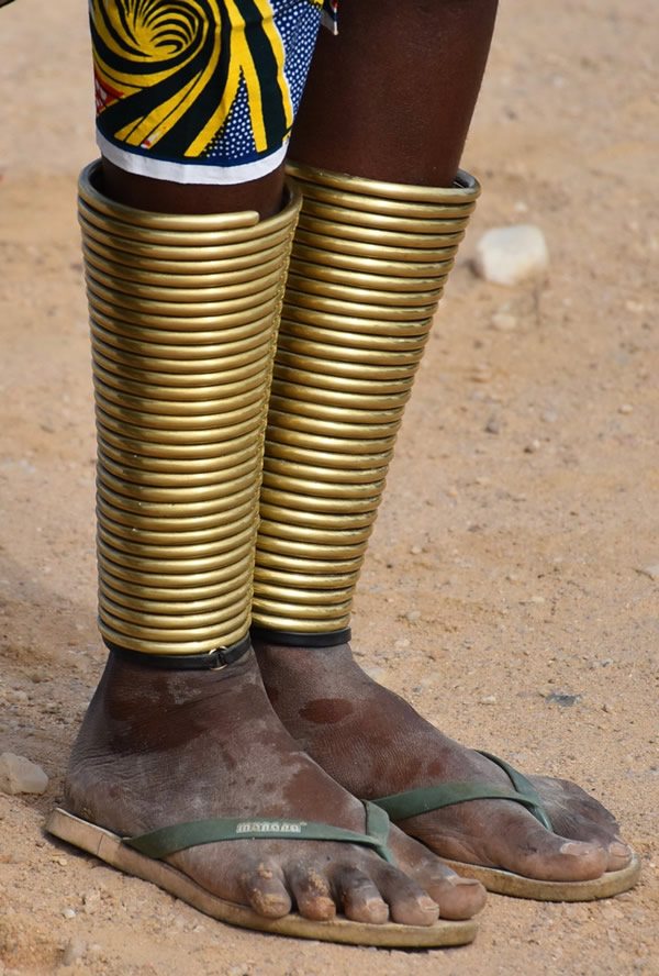 Muila woman with traditional necklaces and dreadlocks in Angola.