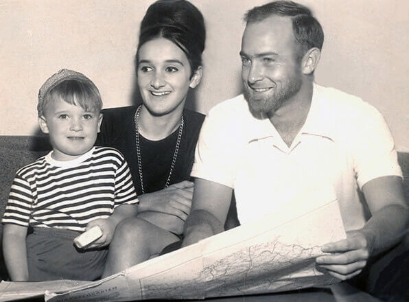 Gregory Hubbs with his family after a return from the first of their extended travels.