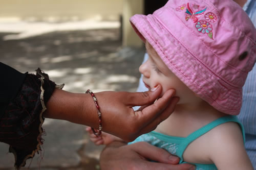 Both children are a constant source of fascination to the locals in India.