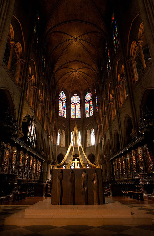 Listen to music in Notre Dame while looking at the magestic nave.