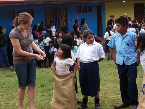 Volunteering with children in Panama, here playing a game, is an option available across Latin America.