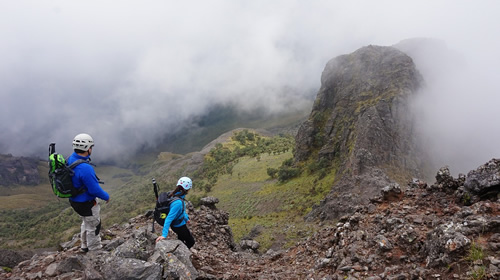 Two people mountain trekking in Ecuador.