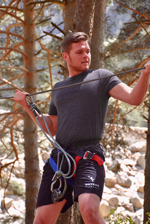 Man zip lining in Andorra.