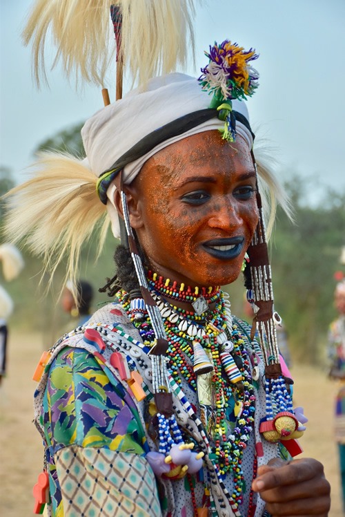 A proud and charming winner of the male beauty contest.