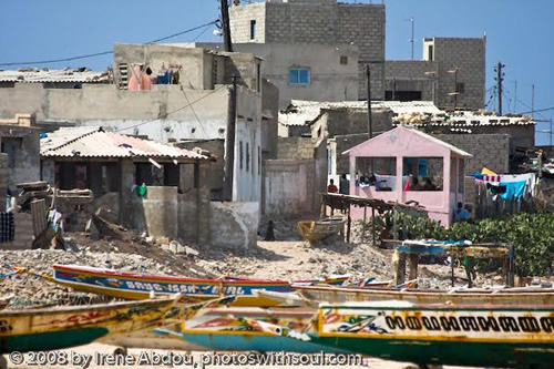 Port with boats facing part of Dakar, Senegal.