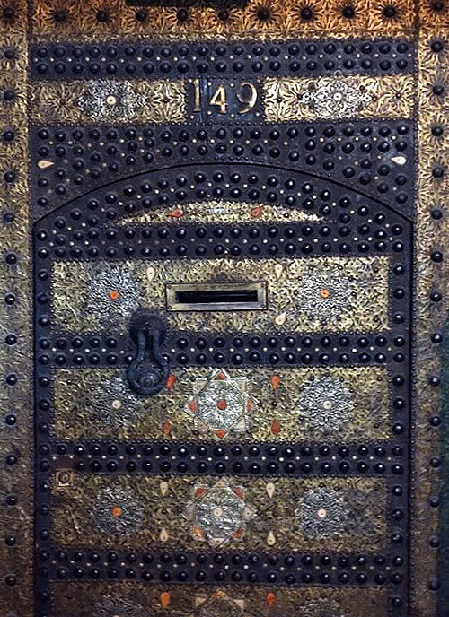 Ornate golden door in Marrakesh, Morocco.