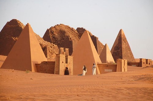 Men at pyramids.