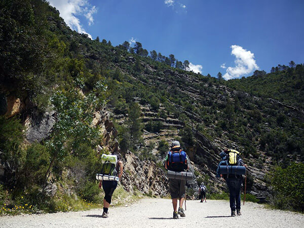 Travelers hiking up hot and dry mountains should pack as light as possible.