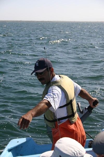 Pangadero working on a panga boat in Mexico.