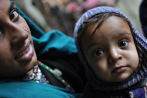 Van Gujjar tribe mother and child in northern India.