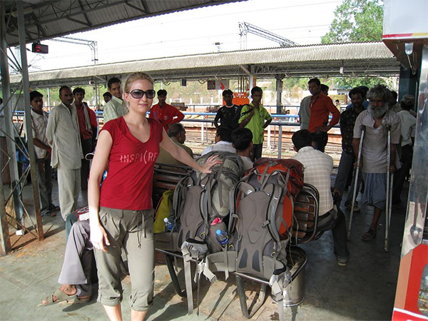 Author waiting for train with backpacks in India.
