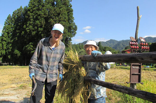Brooke and Kentaro on her first day in Japan at his country house as they harvest.