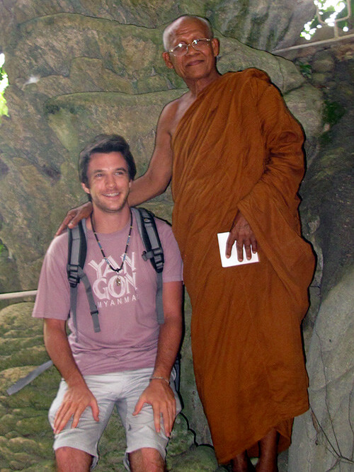 Monk with the author in a cave in Thailand just before his departure.