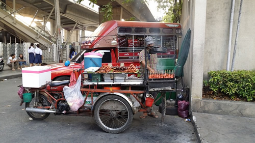 A food cart in Thailand where locals eat.