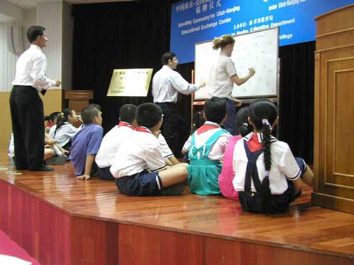 The author teaching English to a class of children in China.