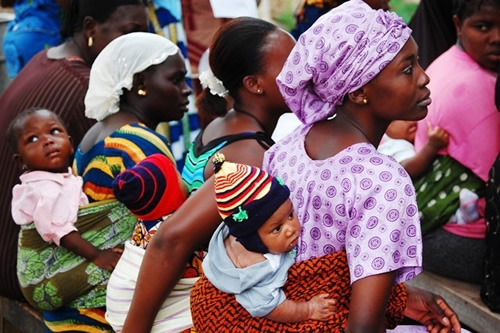 Mothers attend a health education seminar.