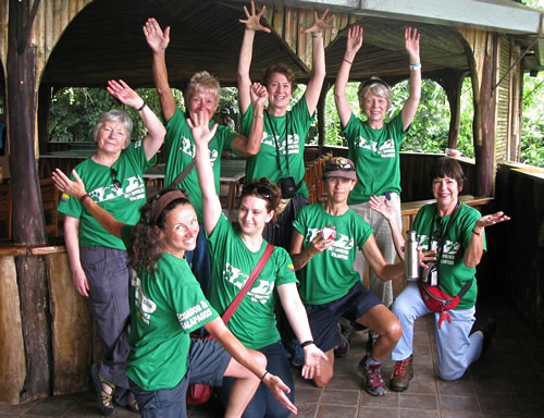 Volunteers feeding animals in Ecuador.