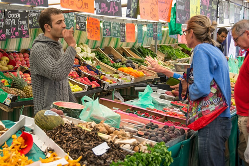 A stall at a fruit and vegetable market in Paris.