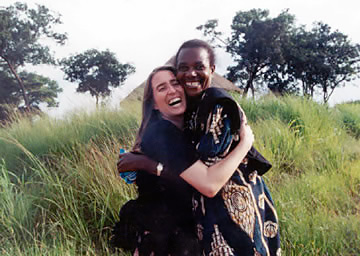 Zahara in Zambia, here with a new friend, while engaged in safe solo women travel.