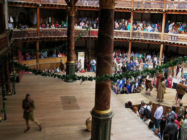 Acting at a performance at the Globe Theatre in London.