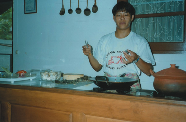 Teacher at a Thai cooking class in Thailand.