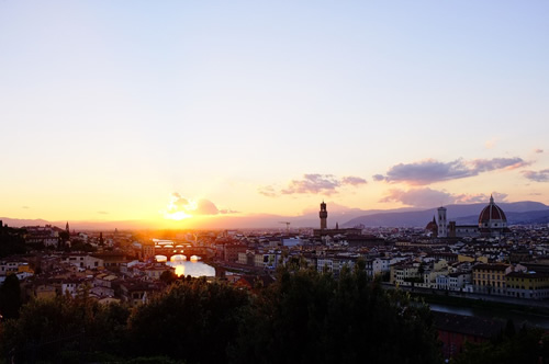 Arno river and Duomo cathedral in Florence, Italy seen at sunset.