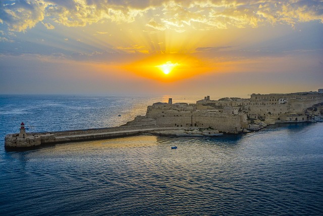Sunset on the Malta Bay and the historic town of Valletta.