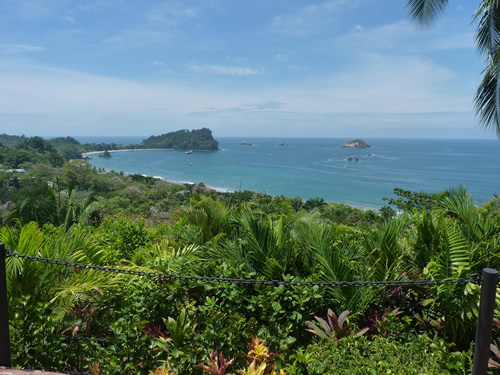 Lush landscape looking from the land to the Pacific Ocean in Costa Rica.