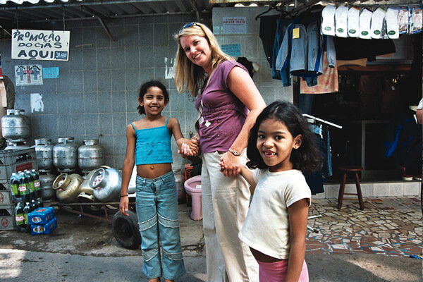 Holding hands with children in Rio de Janeiro.