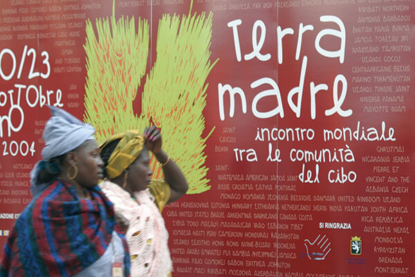 African woman walking at the Terra Madre meeting in Italy.