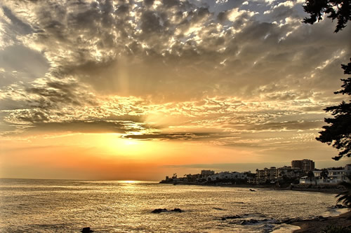 Sun setting over the town of Mijas in the Costa del Sol.