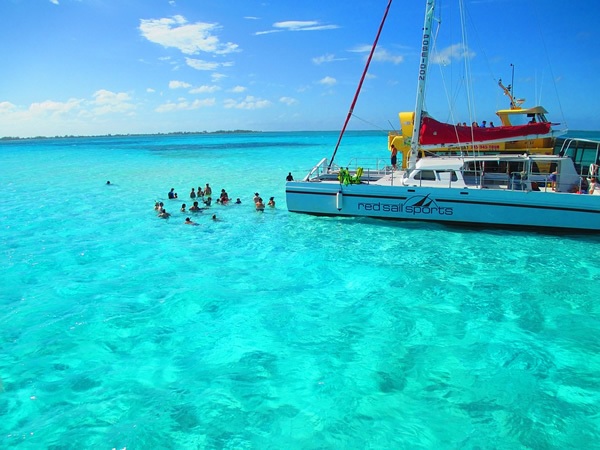 Party near a boat in the Cayman Islands