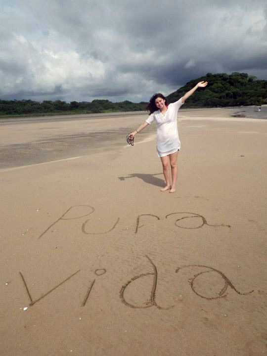 Language Learning Costa Rica is a form of the 'Pura Vida' which the author joyfully wrote in the sand on a beach.