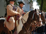 Living in Argentina, riding horses.